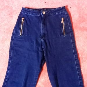 Dark blue jeans with gold details